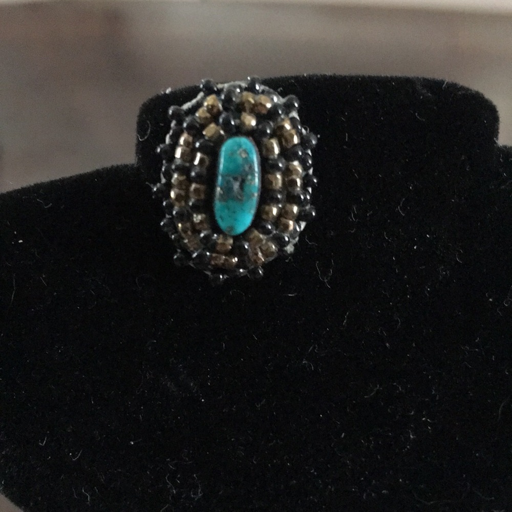 Vintage handmade beaded pin with turquoise stone